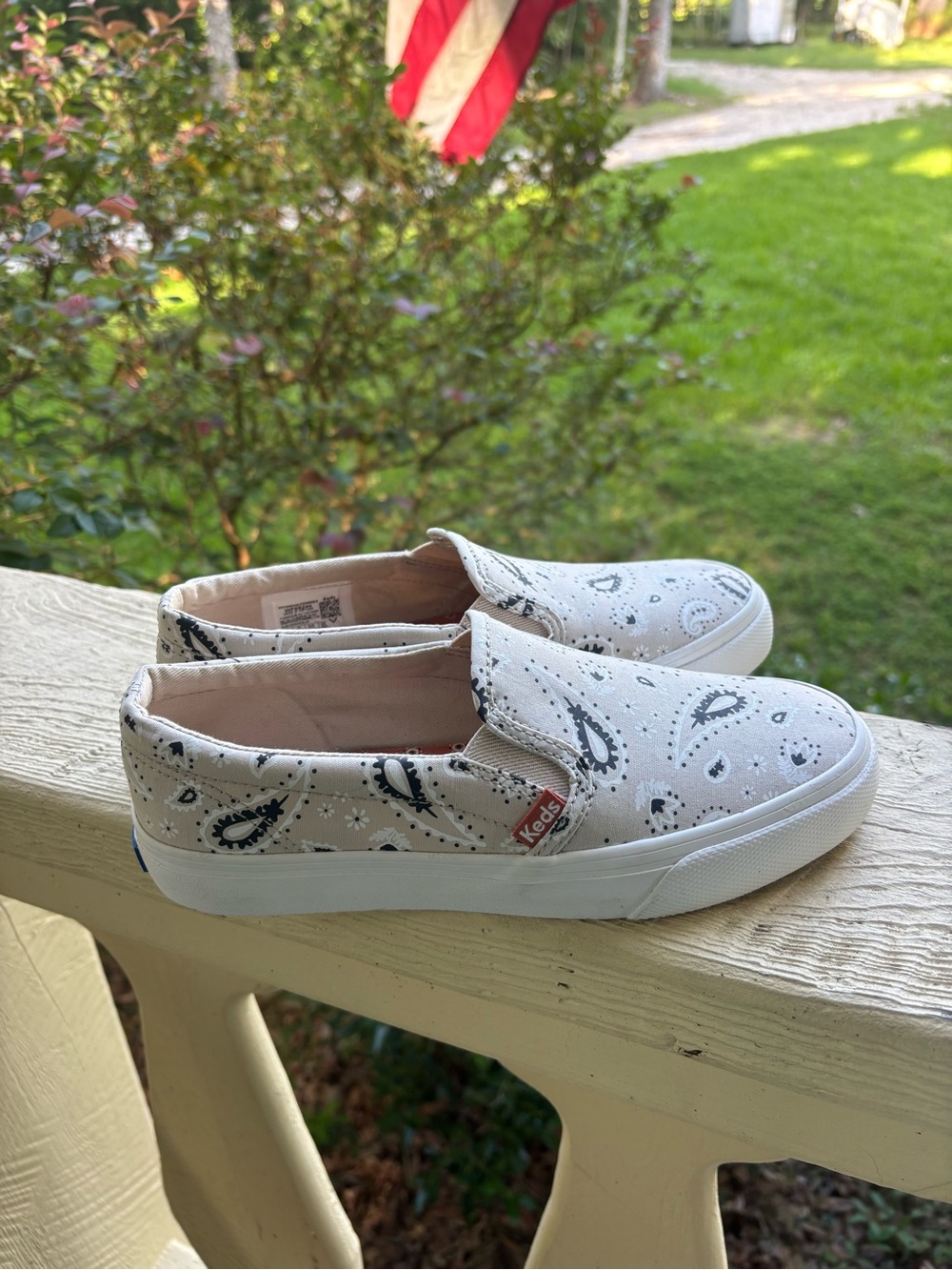 Keds White Slip-On Sneakers with Black Paisley Print
